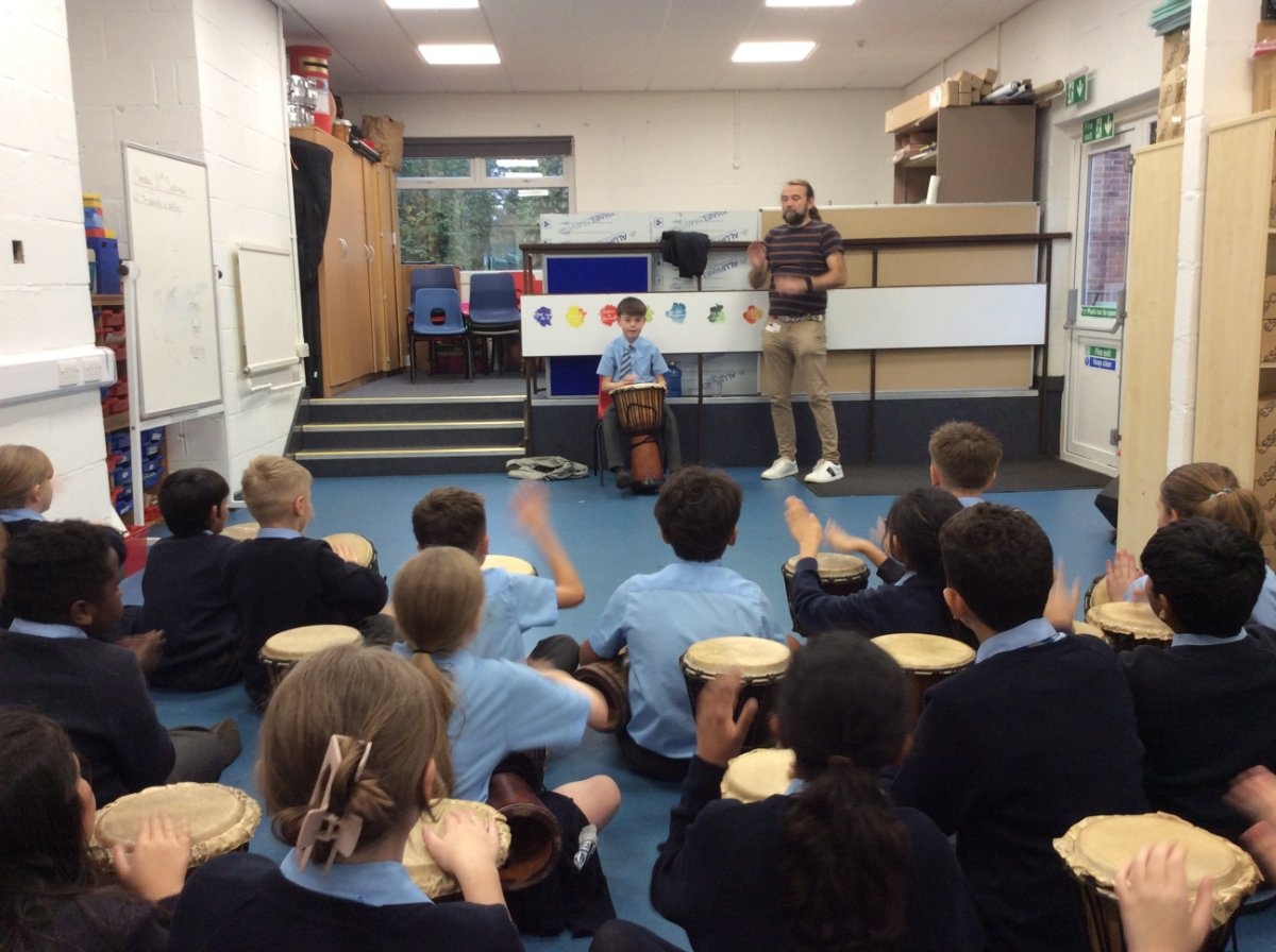 Children learning about African drumming 